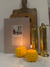 Load image into Gallery viewer, x1 Carved Pumpkin Candle
Size : 116g
Height 6.5cm
Width 5.5cm
x1 Pumpkin Candle
Size: 158g
Height 7.5cm
Width 7.5cm
Beautiful kept as a home decoration or to be lit. When lighting candles please ensure candles are placed on a fire safe coaster or tray, as wax drops will melt onto the surface. Please keep the wick trimmed to 5mm prevent mushrooming and soot. Do not burn for more then 4 hours at a time.
Please try to keep your candles out of direct sunlight as this can cause frosting to form on you